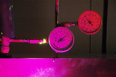 heater repair furnace repair central gas furnace repair. Freon leak exposed under ultra violet light. Freon leak detection experts.