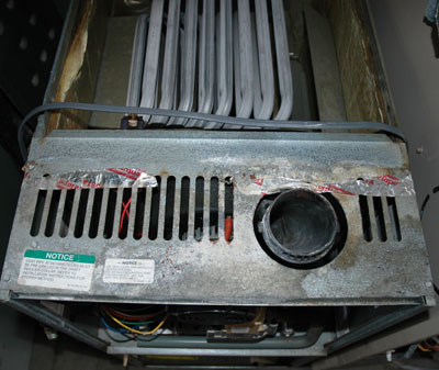 heater repair furnace repair central gas furnace repair. Rheem furnace showing signs of condensation damage